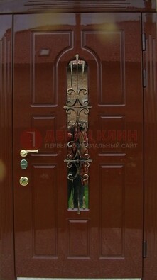 Красивая металлическая дверь со стеклом и ковкой ДСК-33 В Ижевске